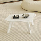 Table basse moderne en forme de nuage blanche avec pieds en bois massif